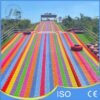 Multi Lane Rainbow Dry Tubing Slide on Hillside