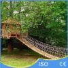 Garden Rope Bridge Spanning Green Lawn