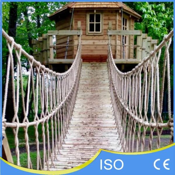 Rope Suspension Bridge Leading to Wooden Treehouse