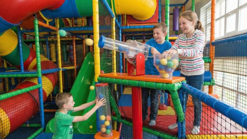 Children engaging in cooperative interactive play