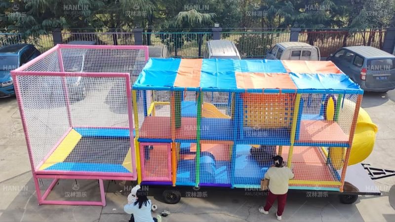 High Angle View Of Mobile Soft Play Roof Cover And Trampoline