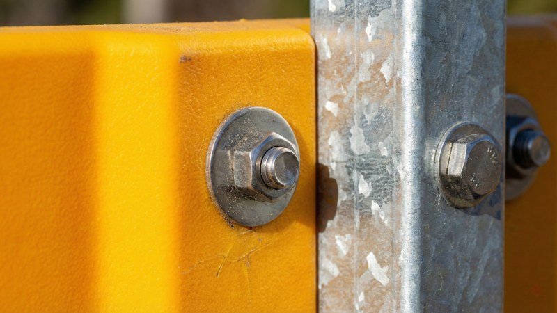 Close up of high density polyethylene playground panels and galvanized steel