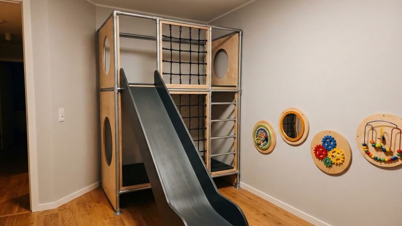 Compact Vertical Play Frame And Wall Panels For Small Spaces