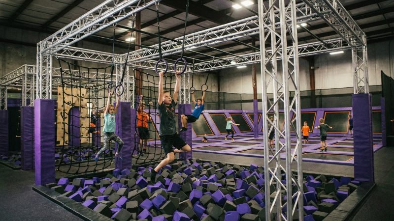 Indoor Ninja Warrior Obstacle Course Over Foam Pit