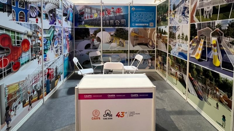 Custom play equipment design posters displayed at exhibition booth