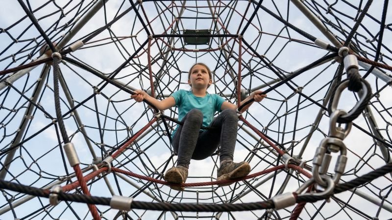 Child Developing Balance in 3D Rope Matrix