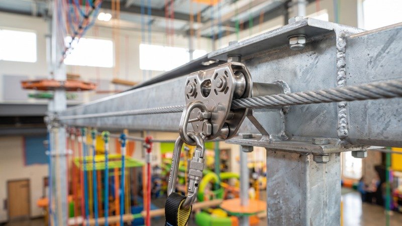 Rope Course Construction Equipment And Belay System