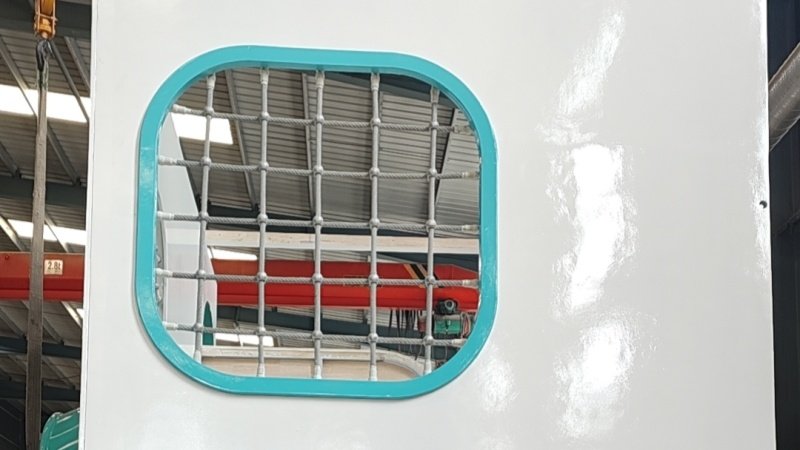 Front View Of Playhouse Safety Net Window And Structure